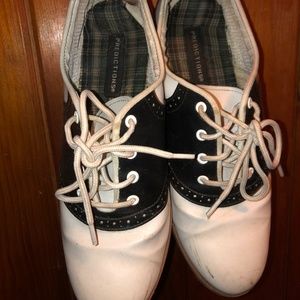 Black and white saddle shoes